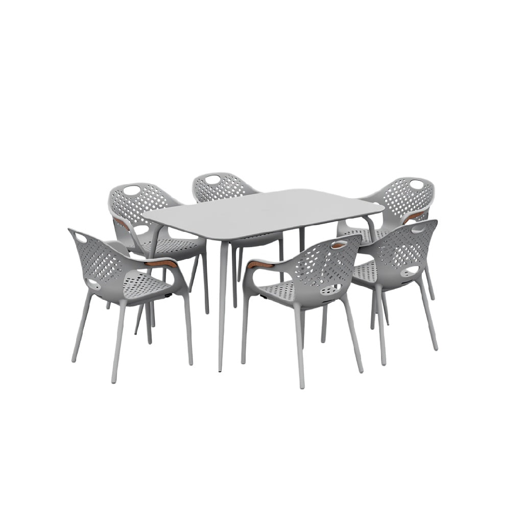 Moderne grijze kunststof eettafel met zes stoelen met gatenpatroon